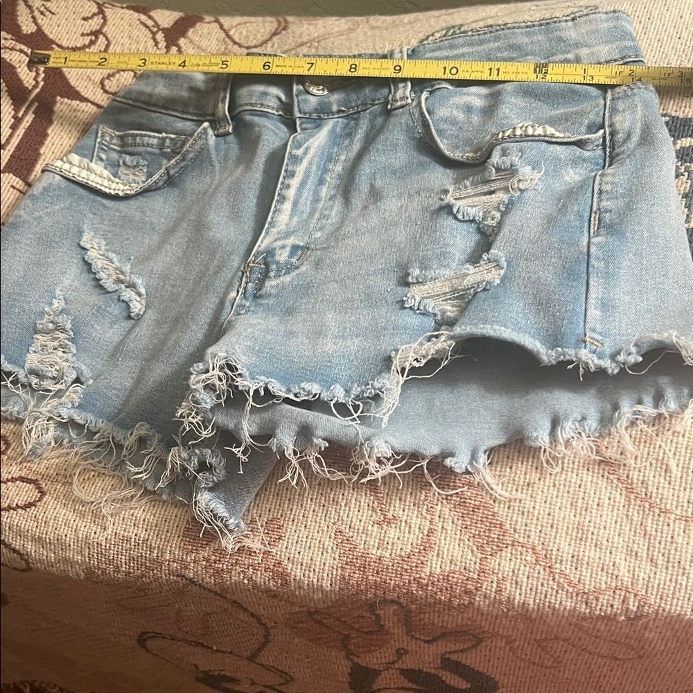 #1010+ Distressed Light Blue Denim Shorts - Picture 2 of 3